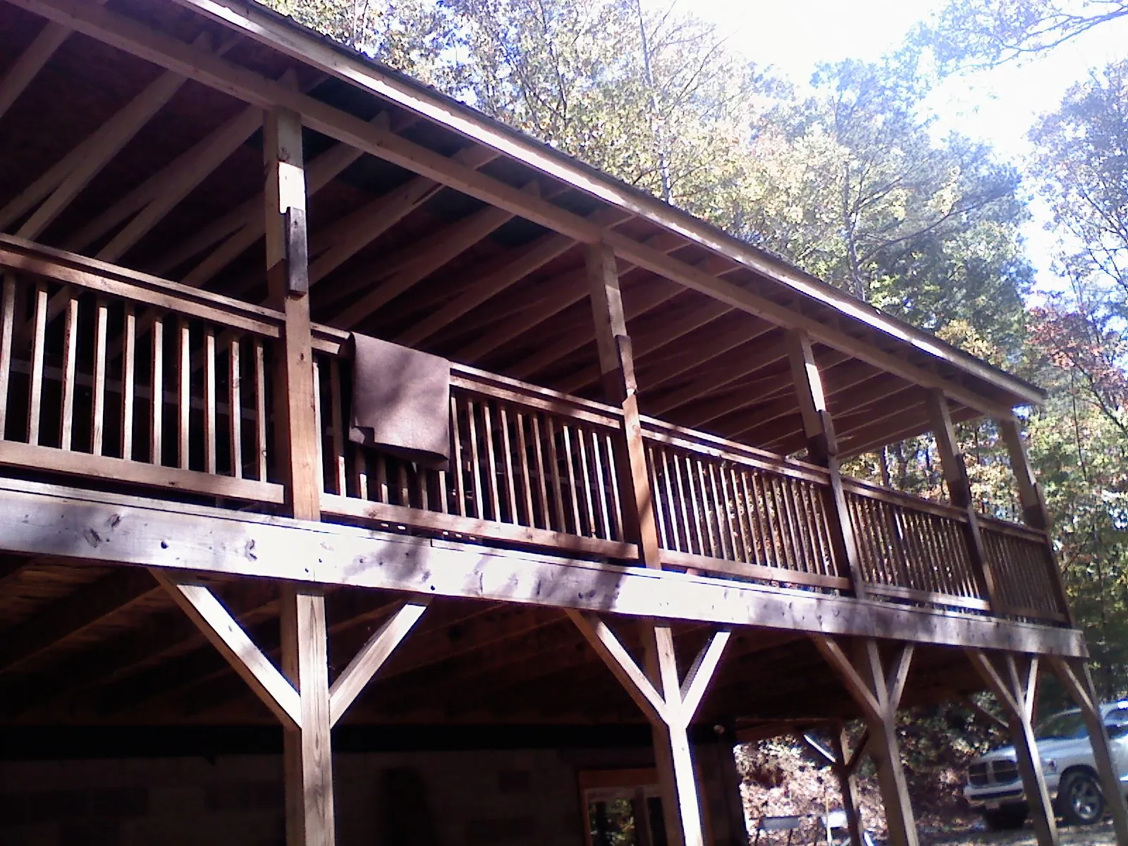 Timber framing under a new elevated porch and deck — Roof Leak Repair in Lee Center by Roofing Brothers